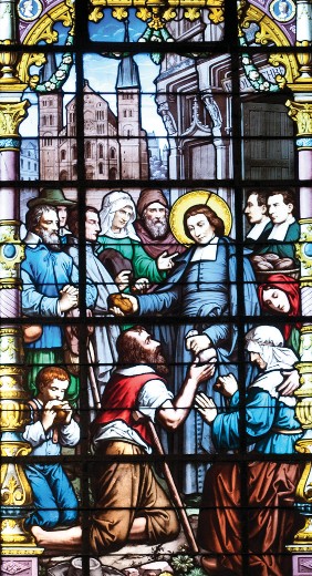 He Distributes His Patrimony to the Poor glass stained window